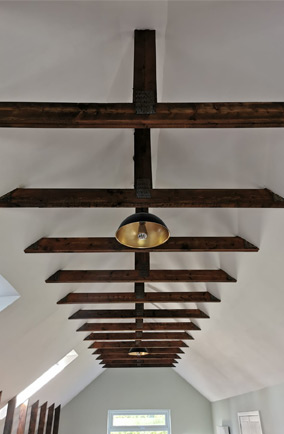 Exposed feature ceiling beams in a loft conversion